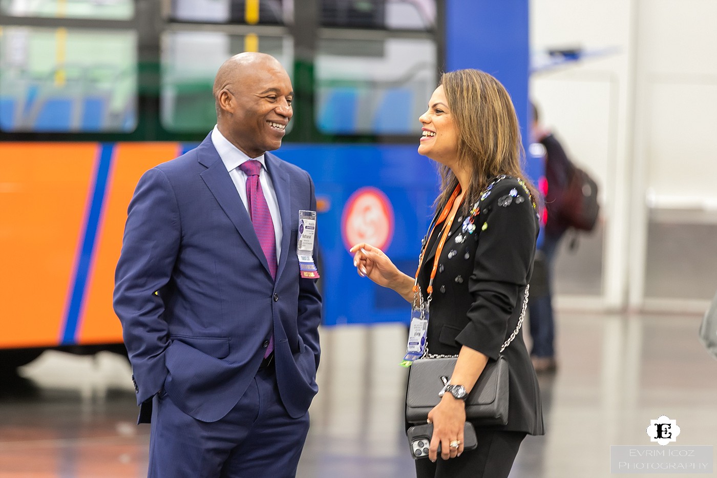 Two Attendees Having a Conversation by Portland Conference Photographer